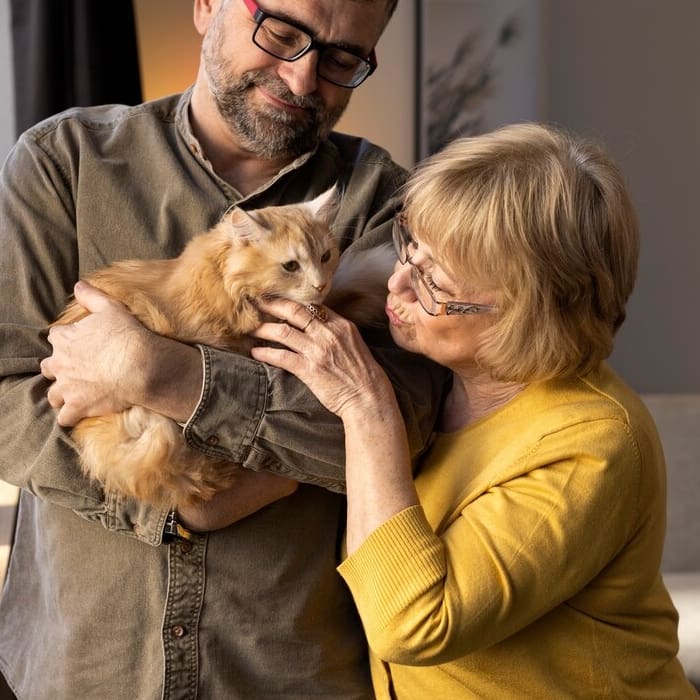 Elderly people with cat pet Elderly people with cat pet